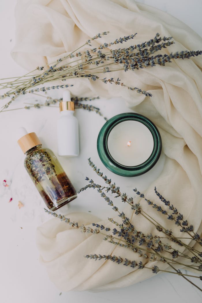 services-03 A calming flat lay of spa essentials featuring lavender and candles for relaxation.